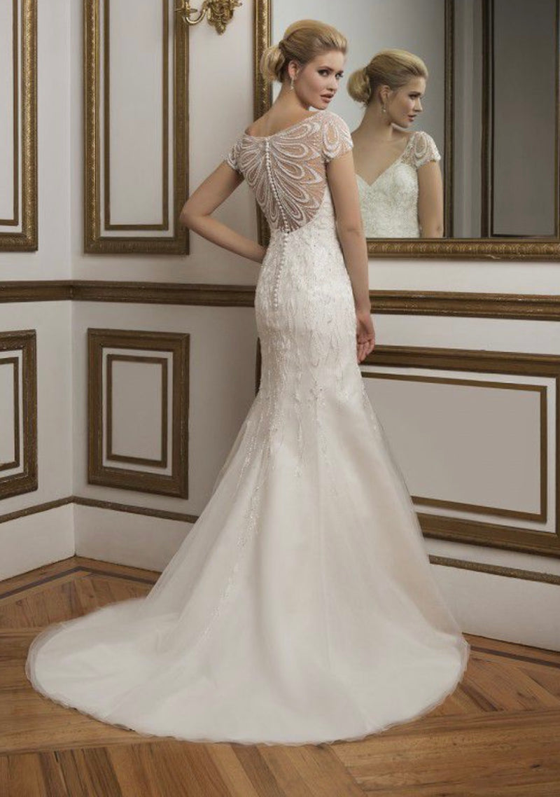 Justin Alexander 8846 is an intricately beaded sleeves, V-neckline fit and flare gown rich in color and glamorous in every way. Inspired by a true work of art, a painting. Size 10, new condition. Available to view in store.