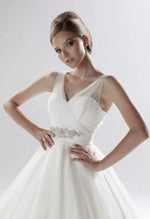 Ellis Bridal 11228 gorgeous v-neck, tulle wedding gown. Stunning a-line silhouette with intricate, beaded waist detail