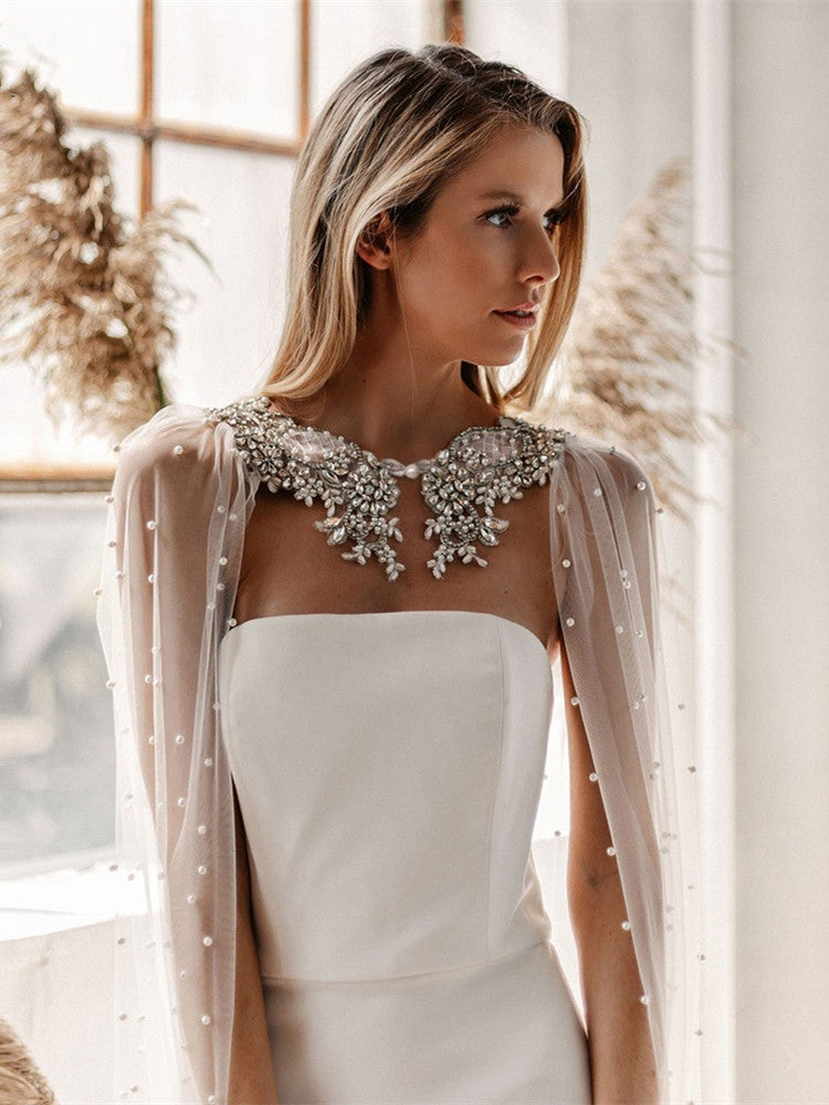 Adela Bridal Cape VL60 Exquisite bridal cape with scattered pearls and embellished neckline, and cowl back