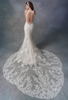 Kenneth Winston 1793 is a beautiful embroidered cotton lace on English net and organza mermaid wedding dress. Gown has built-in foundation and stretch lining for added comfort. Beautiful halter neck with a keyhole back