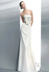 Stunning Jesus Peiro Estrella Snow Star is an ivory satin bridal gown with stunning waist detail. Size 12, chapel train, strapless. New condition.