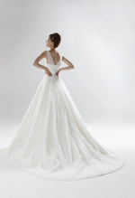 Ellis Bridal 11228 gorgeous v-neck, tulle wedding gown. Stunning a-line silhouette with intricate, beaded waist detail