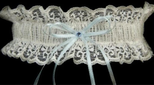 Garter TLG507 Ivory lace garter with blue ribbon and diamanté centre