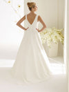 Bianco Evento Dalila is a simple a-line wedding dress, with a beautiful v-neckline and back. The dress is made from Chiffon and has a fine belt with a front bow brings the dress together.