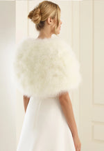 BIANCO EVENTO BOLERO E184 Eye catching marabou feather cape, perfect for a winter wedding  Carefully designed and manufactured within the EU.